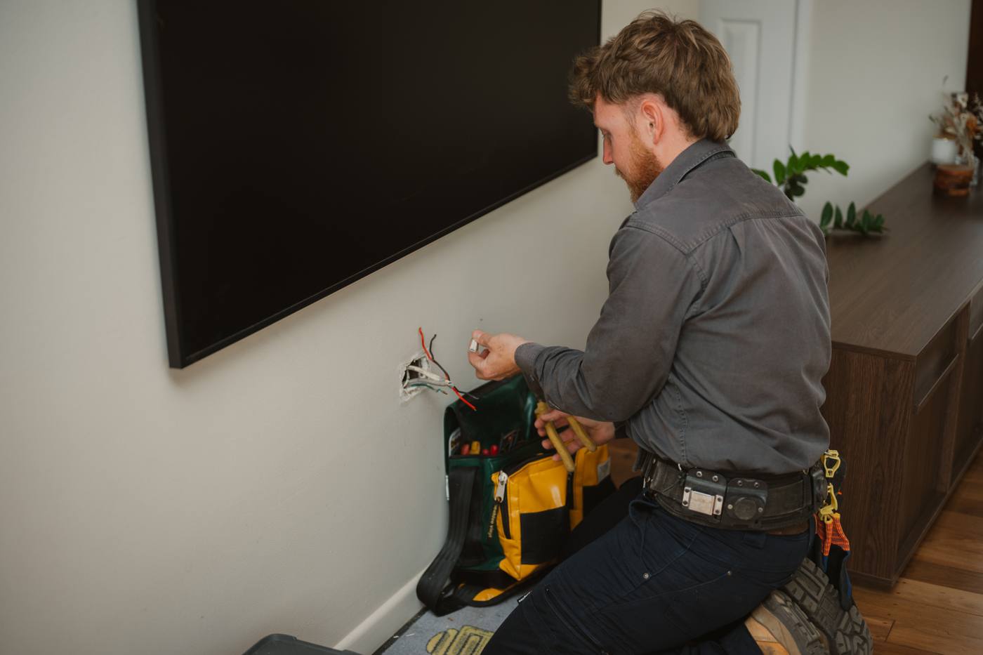 Electrician wiring a new power point