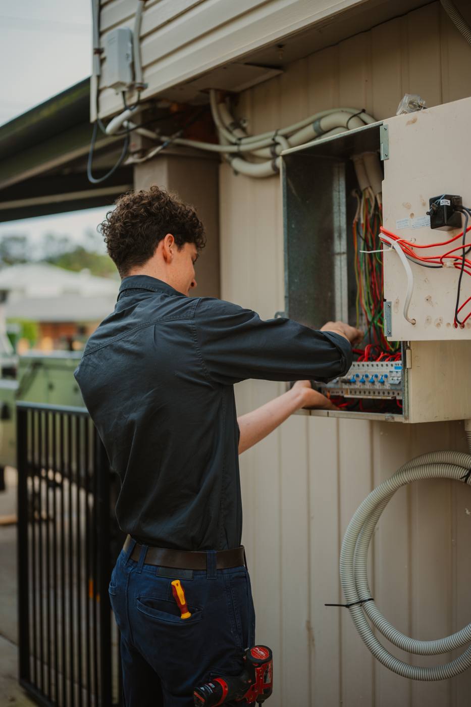 Electrician working on a switchboard