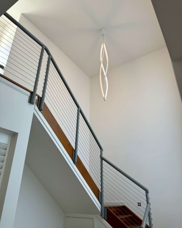 LED pendant light hanging in a stairwell in Coorparoo