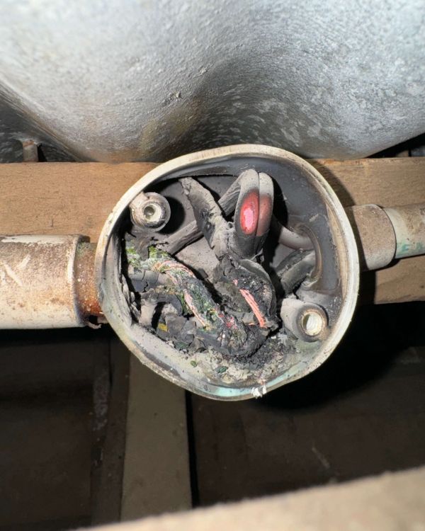 Burnt, melted wiring connection found during fault finding in Petrie