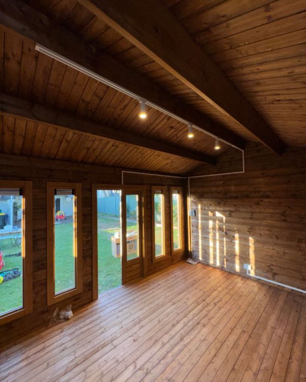 Downlights and feature lighting in a timber she-shed in Wynnum